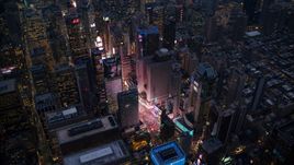 Bright lights of Times Square at sunset in Midtown Manhattan, New York City Aerial Stock Photos | AX121_105.0000077F