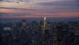 Tall Midtown Manhattan towers at sunset in New York City Aerial Stock Photos | AX121_115.0000025F