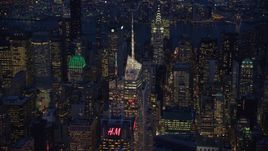 Top of Bank of America Tower in Midtown at night in New York City Aerial Stock Photos | AX121_132.0000030F