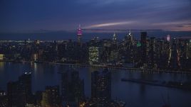 The UN Building and Midtown seen from Queens at night in New York City Aerial Stock Photos | AX121_143.0000082F