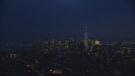 The Lower Manhattan skyline at night in New York City Aerial Stock Photos | AX121_153.0000127F