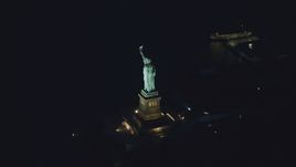 The Statue of Liberty at night in New York Aerial Stock Photos | AX121_167.0000184F