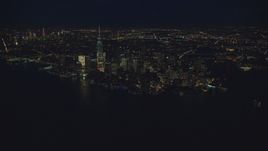 Lower Manhattan at night, New York City, seen from New York Harbor Aerial Stock Photos | AX121_171.0000102F