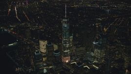 Freedom Tower and the World Trade Center Memorial at night in Lower Manhattan, New York City Aerial Stock Photos | AX121_174.0000176F