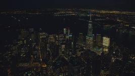 Skyscrapers in Lower Manhattan at nighttime in New York City Aerial Stock Photos | AX121_177.0000336F