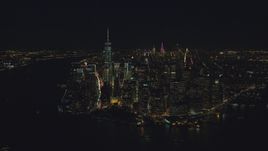 Lower Manhattan skyscrapers at night in New York City Aerial Stock Photos | AX121_193.0000103F