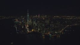 Lower Manhattan skyscrapers at night in New York City Aerial Stock Photos | AX121_193.0000245F