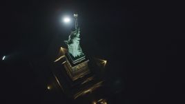 A bird's eye view of the back of the Statue of Liberty at night in New York Aerial Stock Photos | AX121_196.0000108F