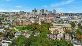 Dorchester Heights Monument in South Boston, and Downtown Boston skyline, Massachusetts Aerial Stock Photos | AX142_226.0000344