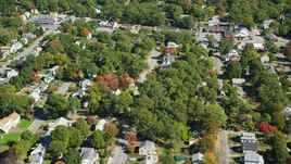 Small town neighborhood, trees in autumn, Randolph, Massachusetts Aerial Stock Photos | AX143_005.0000000