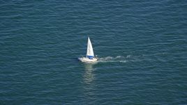 A small sailing boat on Cape Cod Bay, Massachusetts Aerial Stock Photos | AX143_125.0000349