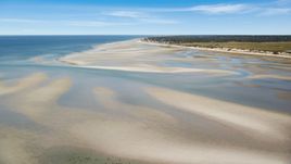 Sand bars by small coastal town, Cape Cod, Dennis, Massachusetts Aerial Stock Photos | AX143_149.0000000