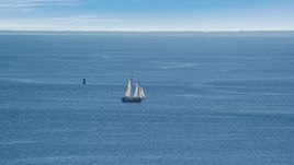 A sailing boat in Cape Cod Bay, Massachusetts Aerial Stock Photos | AX143_220.0000000