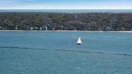 A small island town, sailboats on water, Nantucket, Massachusetts Aerial Stock Photos | AX144_074.0000000
