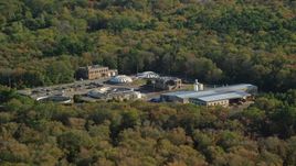 A water treatment plant surrounded by dense trees, Dartmouth, Massachusetts Aerial Stock Photos | AX144_211.0000142