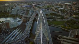 Traffic on the Zakim Bridge, Boston, Massachusetts, sunset Aerial Stock Photos | AX146_088.0000113F