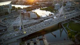 Heavy traffic on the Zakim Bridge at sunset in Boston, Massachusetts Aerial Stock Photos | AX146_088.0000269F