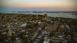 The Dorchester Heights Monument and row houses, South Boston, Massachusetts, twilight Aerial Stock Photos | AX146_115.0000303F