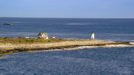 A lighthouse on Straitsmouth Island, Rockport, Massachusetts Aerial Stock Photos | AX147_116.0000000