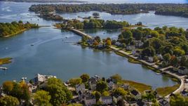 A small bridge and waterfront homes in autumn, Portsmouth, New Hampshire Aerial Stock Photos | AX147_186.0000000