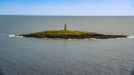 A lighthouse on Little Mark Island in the Atlantic Ocean, Harpswell, Maine Aerial Stock Photos | AX147_377.0000000