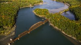 A small bridge spanning Sheepscot River, autumn, Newcastle, Maine Aerial Stock Photos | AX148_006.0000050