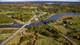 Small bridges, Highway 1 over river near rural homes, autumn, Thomaston, Maine Aerial Stock Photos | AX148_067.0000079