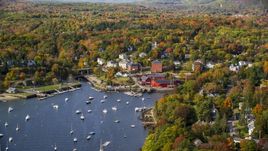 A small coastal town beside a harbor in autumn, Rockport, Maine Aerial Stock Photos | AX148_101.0000000