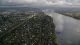Suburban riverfront neighborhoods by Highway 14 in Vancouver, Washington Aerial Stock Photos | AX153_141.0000277F