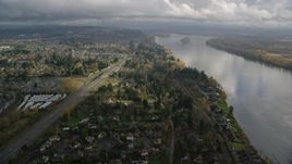 Highway 14 and suburban homes on the Columbia River in Vancouver, Washington Aerial Stock Photos | AX153_142.0000206F