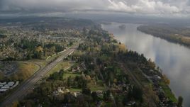 Highway 14 near suburban homes on the Columbia River in Vancouver, Washington Aerial Stock Photos | AX153_142.0000335F