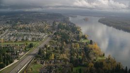 Suburban houses between Highway 14 and Columbia River, Vancouver, Washington Aerial Stock Photos | AX153_143.0000253F