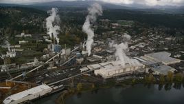 Steam rising from the Georgia Pacific Paper Mill in Camas, Washington Aerial Stock Photos | AX153_152.0000265F