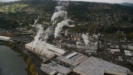 The Georgia Pacific Paper Mill with steam rising in Camas, Washington Aerial Stock Photos | AX153_153.0000255F