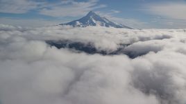 The snowy summit of Mount Hood and low clouds in the Cascade Range, Oregon Aerial Stock Photos | AX154_066.0000182F