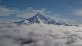 Mount Hood's snowy summit with low clouds, Mount Hood, Cascade Range, Oregon Aerial Stock Photos | AX154_070.0000206F