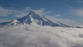 The Mount Hood summit with snow and low clouds, Mount Hood, Cascade Range, Oregon Aerial Stock Photos | AX154_072.0000320F