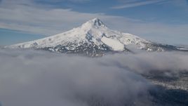 A ring of clouds around the base of Mount Hood, Cascade Range, Oregon Aerial Stock Photos | AX154_115.0000342F