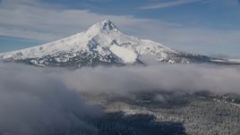 Snow-capped mountain peak and low clouds, Mount Hood, Cascade Range, Oregon Aerial Stock Photos | AX154_117.0000237F