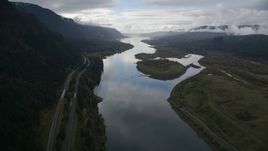 The Columbia River and I-84 highway near islands in Columbia River Gorge Aerial Stock Photos | AX154_179.0000286F