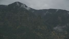 Rugged mountain cliffs and misty clouds on the Oregon side of Columbia River Gorge Aerial Stock Photos | AX154_185.0000000F