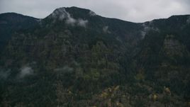 Rugged mountain cliffs and misty clouds on the Oregon side of Columbia River Gorge Aerial Stock Photos | AX154_185.0000238F