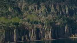 Four waterfalls on steep green cliffs on the Washington side of Columbia River Gorge Aerial Stock Photos | AX154_194.0000136F