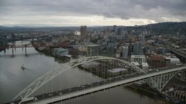 Fremont Bridge and skyscrapers in Downtown Portland, Oregon Aerial Stock Photos | AX155_036.0000000F