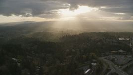 Godrays shining on neighborhoods and Highway 26, Southwest Portland, Oregon Aerial Stock Photos | AX155_118.0000000F