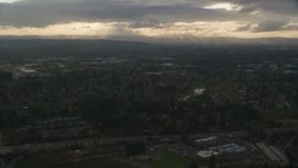 Suburban neighborhood with a lot of trees in Beaverton, Oregon, sunset Aerial Stock Photos | AX155_123.0000000F