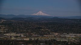 Mount Hood at sunset, seen from a train yard and neighborhoods in Southeast Portland, Oregon Aerial Stock Photos | AX155_248.0000000F