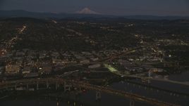 Mount Hood in the far distance, and warehouse buildings near the Willamette River, Southeast Portland, Oregon, sunset Aerial Stock Photos | AX155_266.0000105F