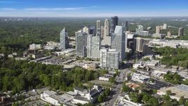 Skyscrapers overlooking forests, Buckhead, Georgia Aerial Stock Photos | AX38_012.0000306F