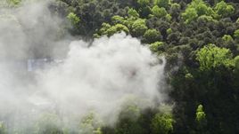 Thick smoke rising from a burning home, West Atlanta, Georgia Aerial Stock Photos | AX38_038.0000393F